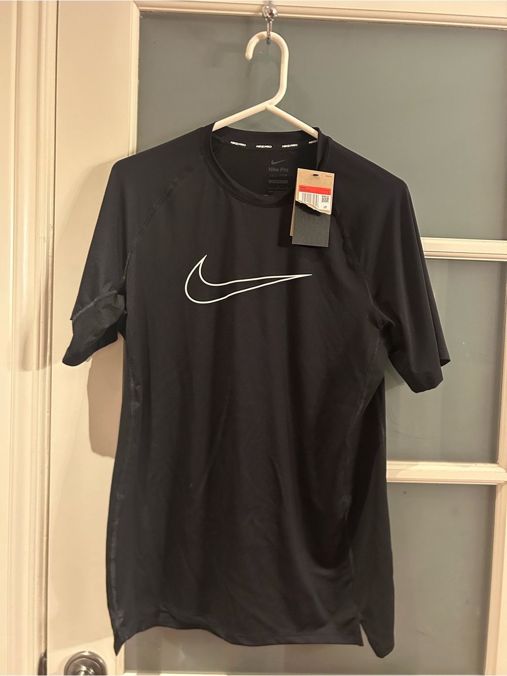 Nike Black Short Sleeve Performance Tee with White Swoosh